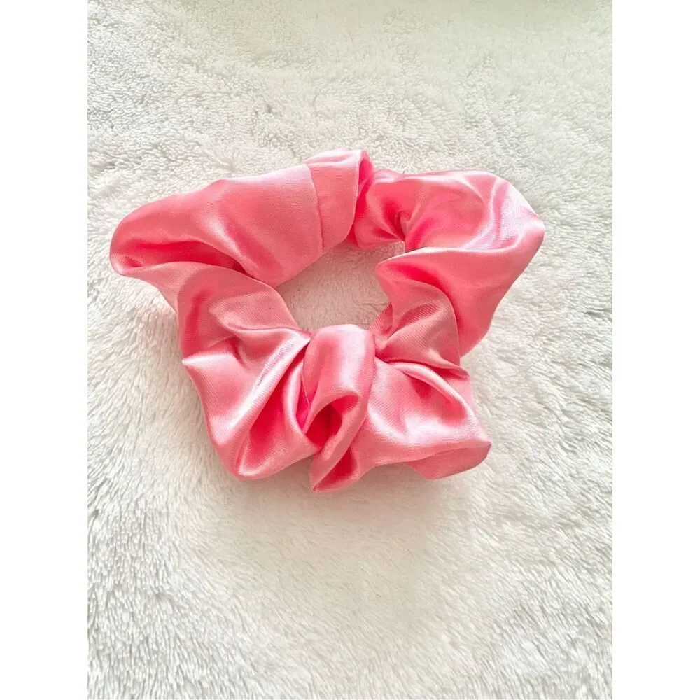 Bright pink color satin hair scrunchie